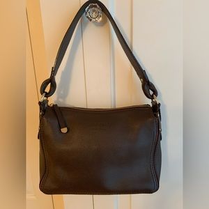 Kate Spade dark brown pebble leather shoulder bag with pink leather trim.